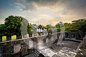 Sunset over the ruins of the walls at Fort Santiago, in Intramuros, Manila, The Philippines. photo