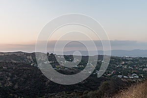 Sunset over the San Fernando Valley in Los Angeles viewed from the Marvin Braude Mulholland Gateway Park, California photo