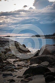 Sunset over Sand Beach in Stonington, Maine.