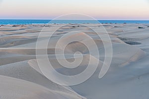 Sunset over sand dunes at Maspalomas, Gran Canaria, Canary Islands, Spain