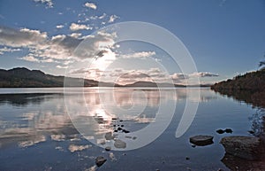 Sunset over Scottish Loch.