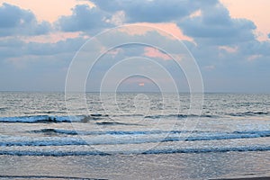 Sunset over Sea with Cloudy Sky, Ladghar Beach, Dapoli, India...