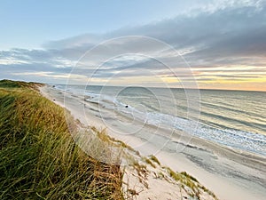 Sunset over the sea at Holmsland Klit in Denmark