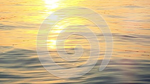 Sunset over the sea. Pier on the foreground in