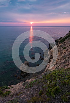 Sunset over the sea in the Sardinian west coast, Italy