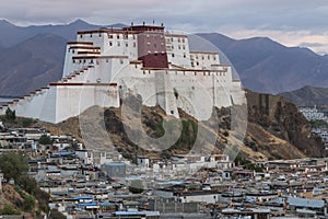 Sunset over Shigatse Dzong Little Potala Palace residence of Panchen Lama, Tibet - China