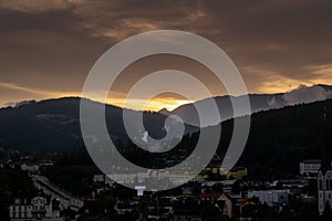 sunset over a small Austrian town after a storm