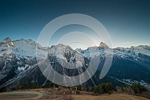 Sunset over snowy mountains