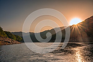 Sunset over Soyanggang Dam during cruise ship on Soyang river in the valley at Chuncheon, South Korea