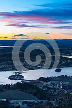 Sunset over Steinsfjorden, a branch of Lake Tyrifjorden located in Buskerud, Norway. View from Kongens Utsikt Royal View at photo