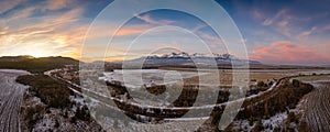 Sunset over the sub-Tatra town of Svit with the river Poprad