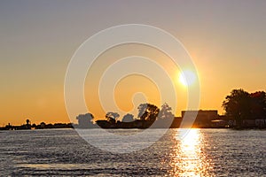 Sunset over the Sulina shipyard and the Danube Delta