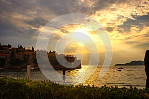 Sunset over Sveti Stefan islet in Montenegro