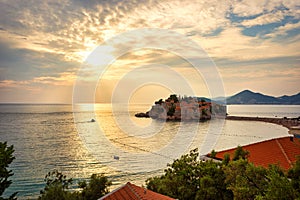 Sunset over Sveti Stefan islet in Montenegro