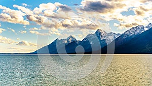 Sunset over the Teton Mountain Range and Jackson Lake in Grand Teton National Park