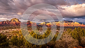 Sunset over Thunder Mountain and other red rock mountains surrounding the town of Sedona