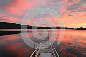 Sunset Over Tranquil Mountain Lake