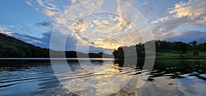 Sunset over twin valley lake at governor dodge state park