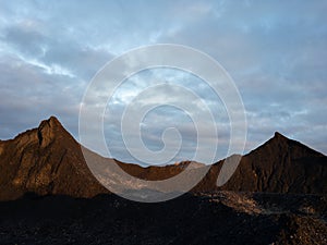 Sunset over two-horned mountain