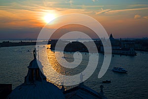 Sunset over Venice. View from the bell tower of the Cathedral of San Giorgio Maggiore. Italy