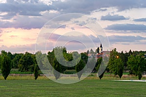 Sunset over a village and church in Central Europe Austria