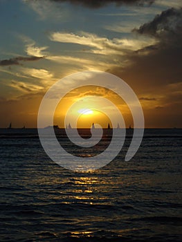 Sunset over Waikiki with sailing boats