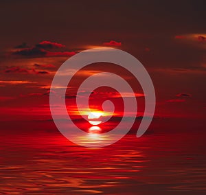 Sunset over water photo