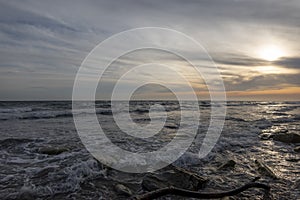 Sunset over the water against sunlight on the Black Sea