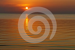 Sunset over the water.