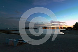 Sunset over water villas photo