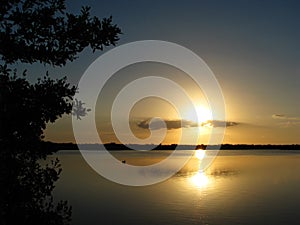 Sunset over waters of Ding Daring Wildlife Refuge, Sanibel, Florida photo