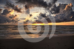 Sunset over the White sand at Delnor Wiggins State Park photo