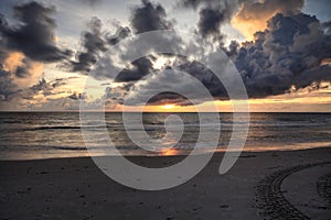 Sunset over the White sand at Delnor Wiggins State Park photo