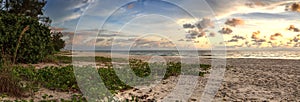 Sunset over the White sand at Delnor Wiggins State Park photo