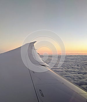 Sunset Over the Wing: A View from Inside the Airplane