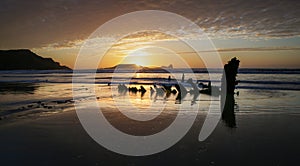 Sunset over Worms Head and the Helvetia