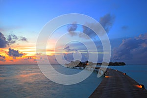 Sunset and overwater villas