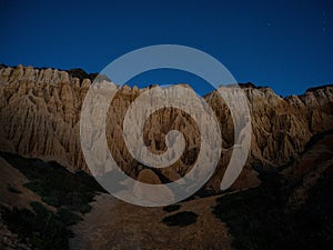 Sunset panorama of Arriba Fossil da Praia da Gale Fontainhas hoodoo fairy chimney earth pyramid rock formation Portugal