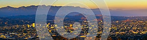 Sunset panorama of downtown Glendale and San Gabriel Mountains in California