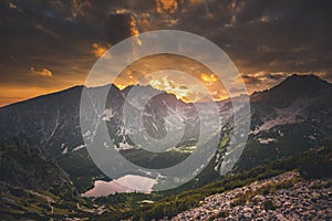 Sunset panorama in High Tatras mountains national park. Mountain popradske lake in Slovakia.