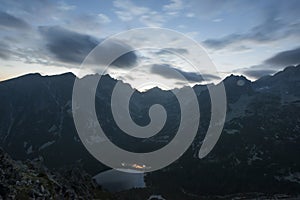 Sunset panorama in High Tatras mountains national park. Mountain popradske lake in Slovakia.