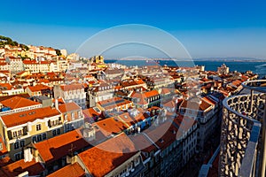 Sunset panorama of historical Baixa District seen from Santa Justa Lift in city of Lisbon, Portugal