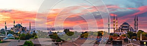 Sunset panorama over Hagia Sophia and the Blue Mosque of Istanbul, view on the city skyline, Turkey