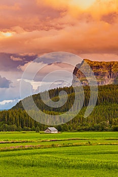 Sunset panoramic nature meadow hill rural field grass green sky panorama land country sunlight scenic outdoors valley sunrise blue