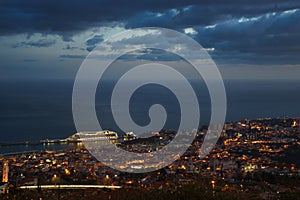 After sunset panoramic view to Funchal with atlantic ocean and cruise ship, Madeira