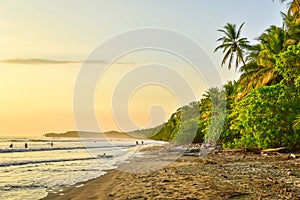 Sunset at paradise beach in Uvita, Costa Rica - beautiful beaches and tropical forest at pacific coast of Costa Rica - travel