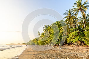 Sunset at paradise beach in Uvita, Costa Rica - beautiful beaches and tropical forest at pacific coast of Costa Rica - travel