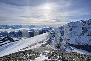 Sunset with parhelium effect from Tupa peak in High Tatras during winter