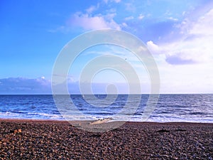 Sunset pastel landscape of the English Channel sea in Sussex.