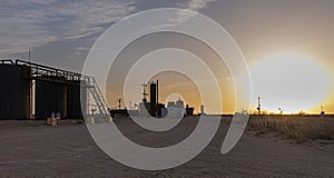 Sunset on Petroleum Storage Tanks